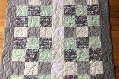 34" x 40" Animal Cuddle Quilt
Betty C.
"Stars and Loops" panto
2017 Client Quilt