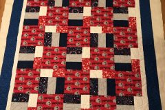 Just Can't Cut It Patriots 56" x 65"
Pieced by Sue P.
Football panto handguided
2018 Client Quilt