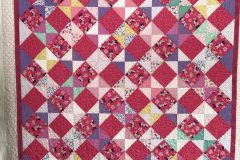 64" x 79" Minnie Mouse
Pieced by Carol S.
Handguided "Daisy Chain" panto
2018 Client Quilt