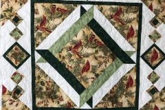 35" x 35" Cardinal Wallhanging
Pieced by Lorna A.
"Christmas Elegance" E2E
2018 Client quilt