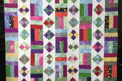 51" x 67" Scrappy quilt
Barbara-Jo B. 
"Bubble Big Small" E2E
2019 Client Quilt